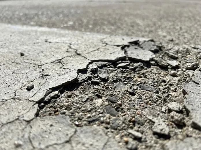 Freeze-thaw concrete surface spalling and severe cracking