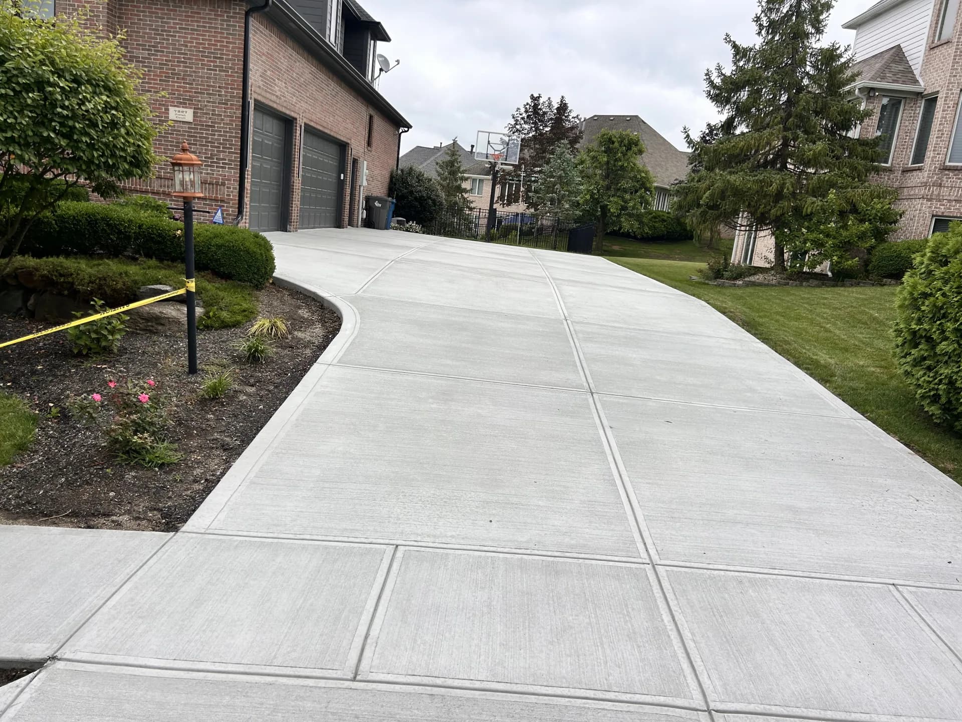 Indianapolis home with clean, newly poured concrete driveway