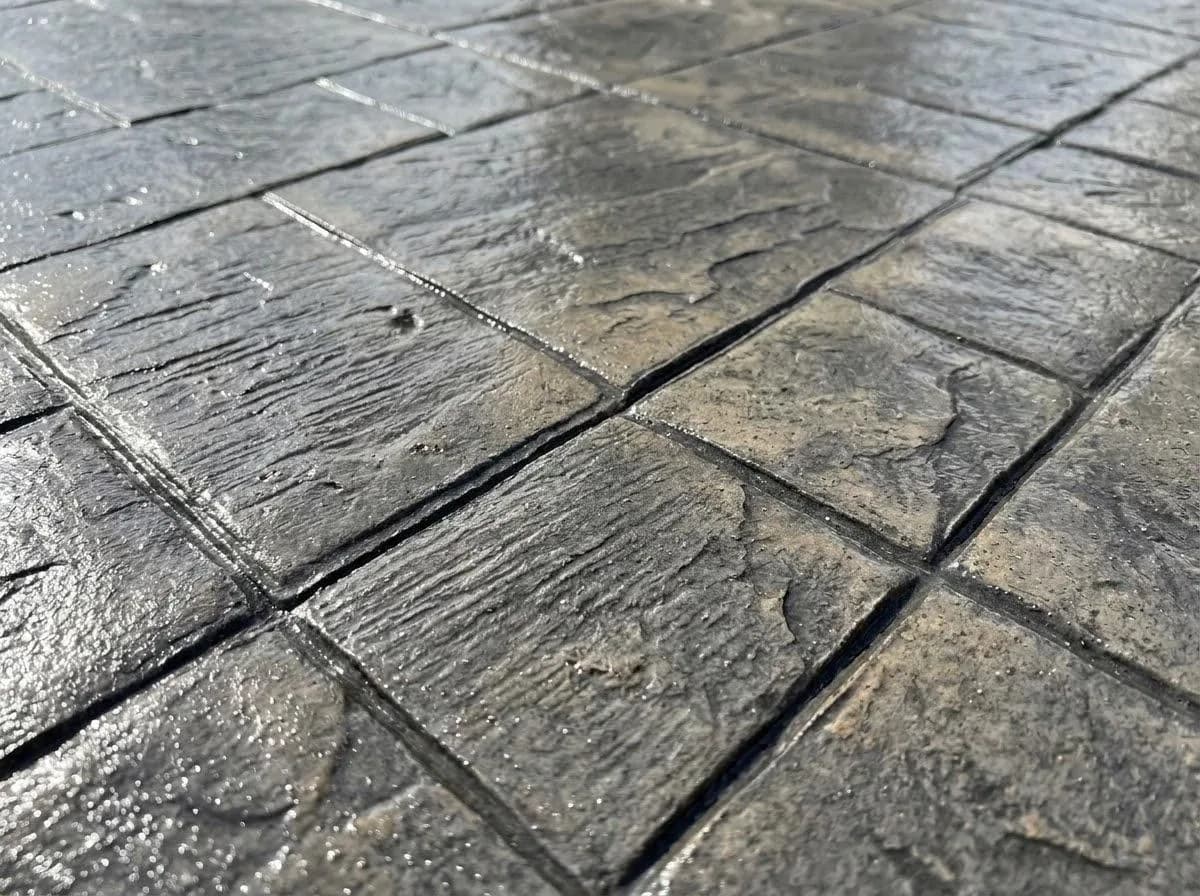Close-up texture of sealed stamped concrete pattern